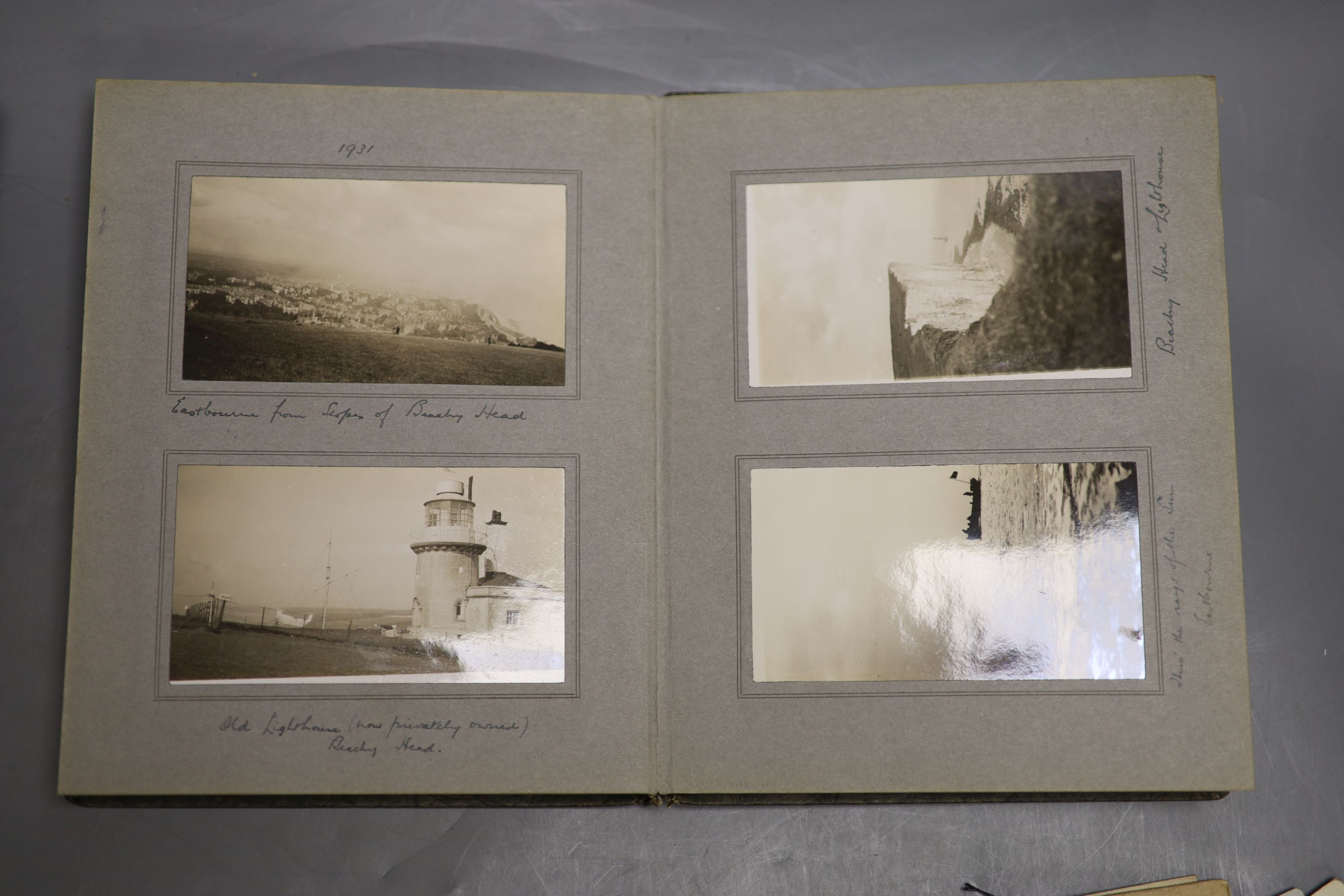 Three albums of photographs and a quantity of postcards inc. erotica.
